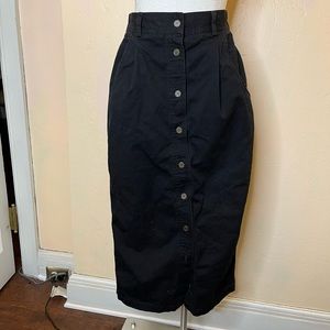 Late 80’s or early 90’s semi fitted button-front Midi skirt, black modern size 8
